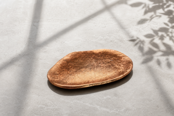 Generated editorial image based on the white porcelain leaf plate