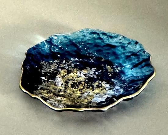 Blue gradient textured small dish, angled view