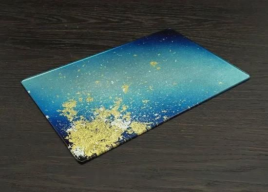 Gradient blue gold leaf plate, angled view