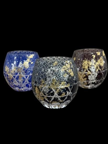 Three Hakumai cut glass tumblers in red, blue and dark blue