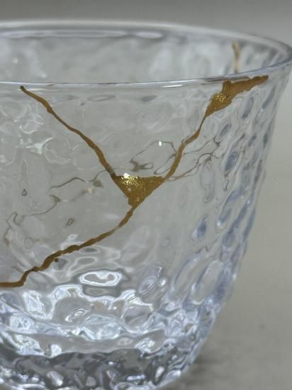 Close-up of the gold kintsugi seams on the glass
