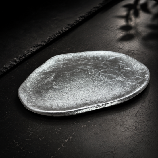White porcelain plate with silver leaf