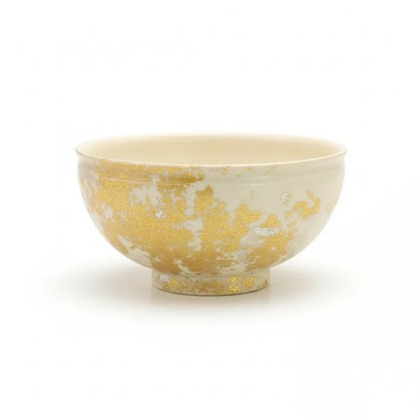 Modern Japan Crafts handcrafted ceramic matcha bowl with off-white base and shimmering gold and silver leaf accents.